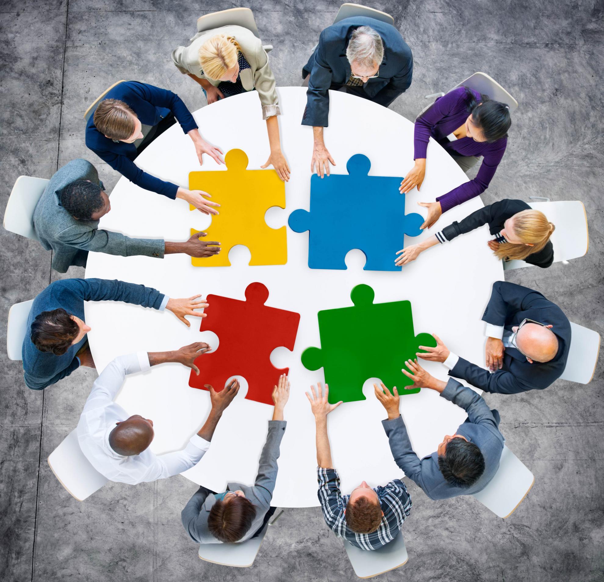 Jigsaw pieces on round table