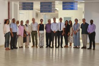 Group of project representatives standing together inside a building in Casablanca, Morocco.