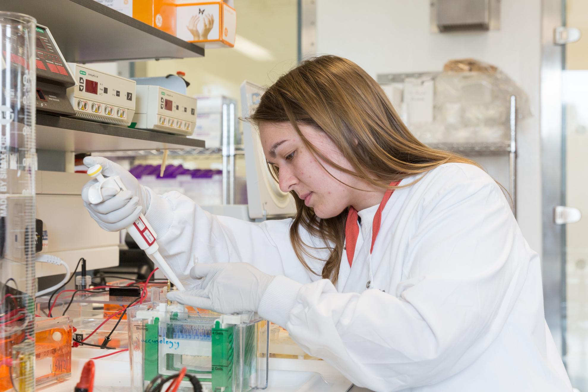 Scientist at bench Scientist at bench